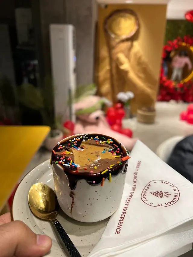 Hot coffee served in a waffle cone at Affogato Cafe, Lahore 2