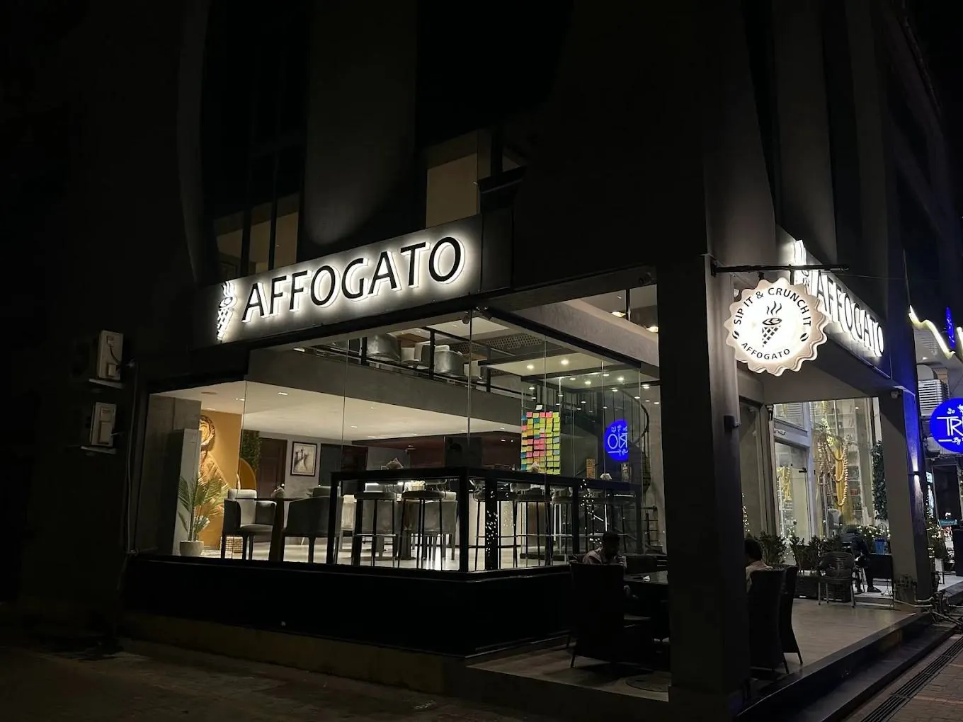 Affogato coffee shop storefront in DHA Phase 4, Lahore at night